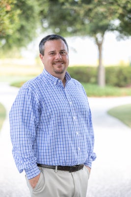 Portrait of Pat Mahaney, Broker